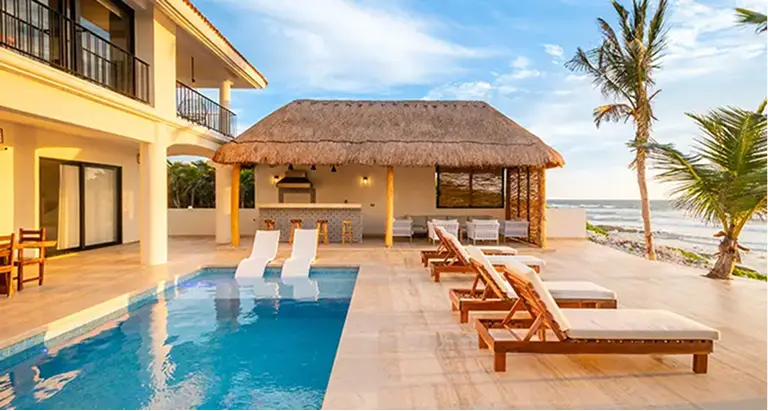 Bella Vita Tulum beachfront villa with private pool and palapa