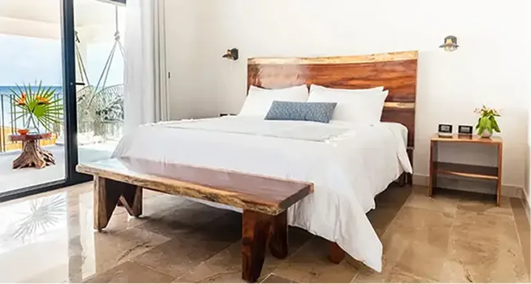 Bella Vita Tulum beachfront bedroom with ocean view